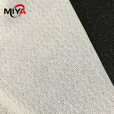 Le tricot de interlignage fusible de tissu tissé par polyester d'élastique de manière de 4 côtés a tricoté